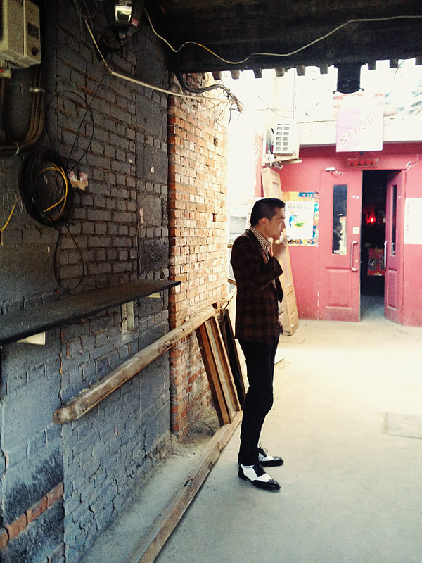 Rockabilly smoking a cigarette.