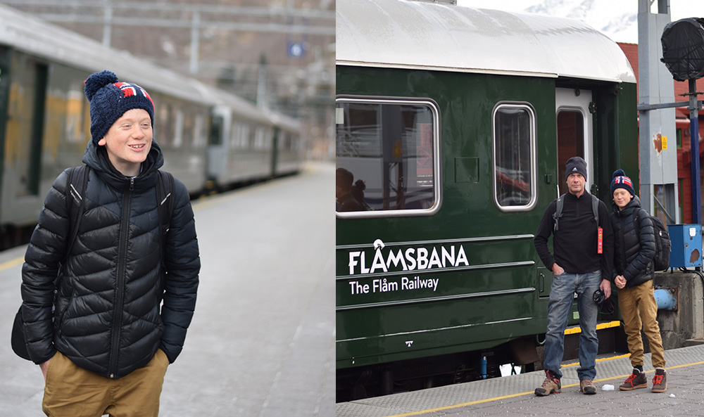 A traveling boy and a boy with his father getting on the Flam Railway in Flam, Norway