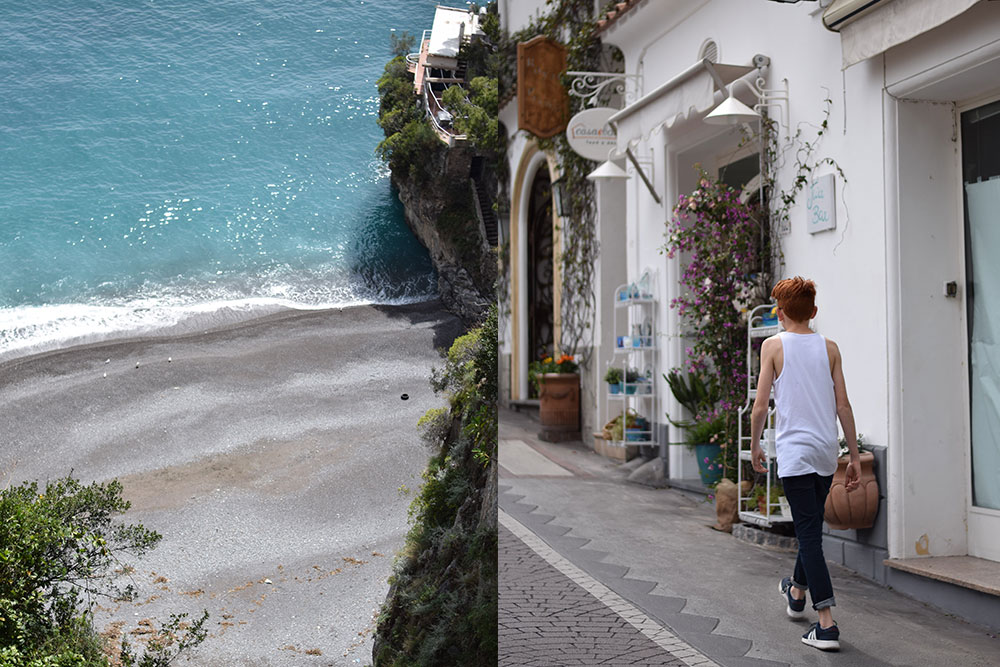 Photo of the beach and a boy walking in the town of Positano, Italy.