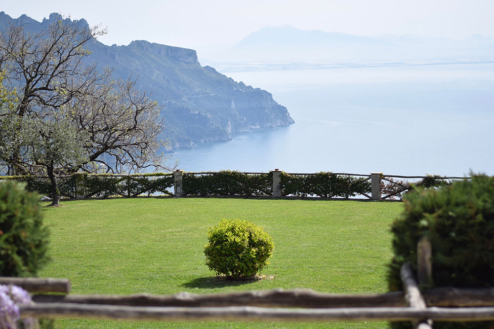 Photo of a garden with a view of the Mediterranean Sea at Villa Cimbrone in Ravello, Italy.