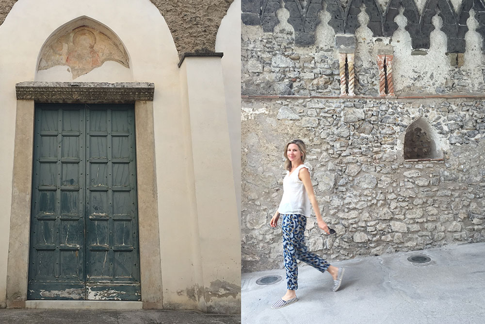 Photo of a a door and a woman walking in Villa Rufulo in Ravello, Italy.