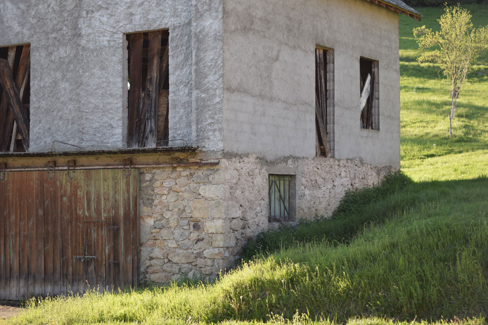 Photo of a stone farmhouse in rural France.